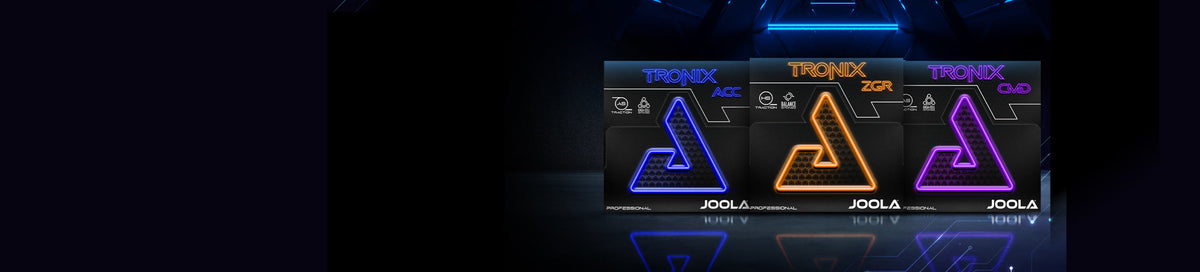 Three JOOLA Tronix professional table tennis rubbers: ACC (blue), ZGR (orange), and CMD (purple).
